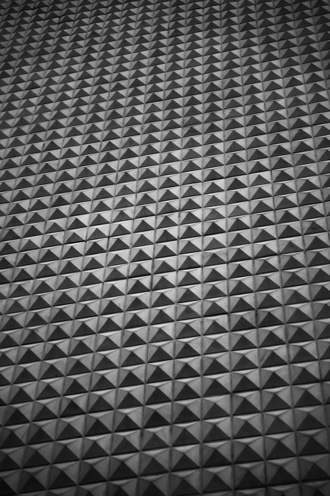 Faceted metal cladding